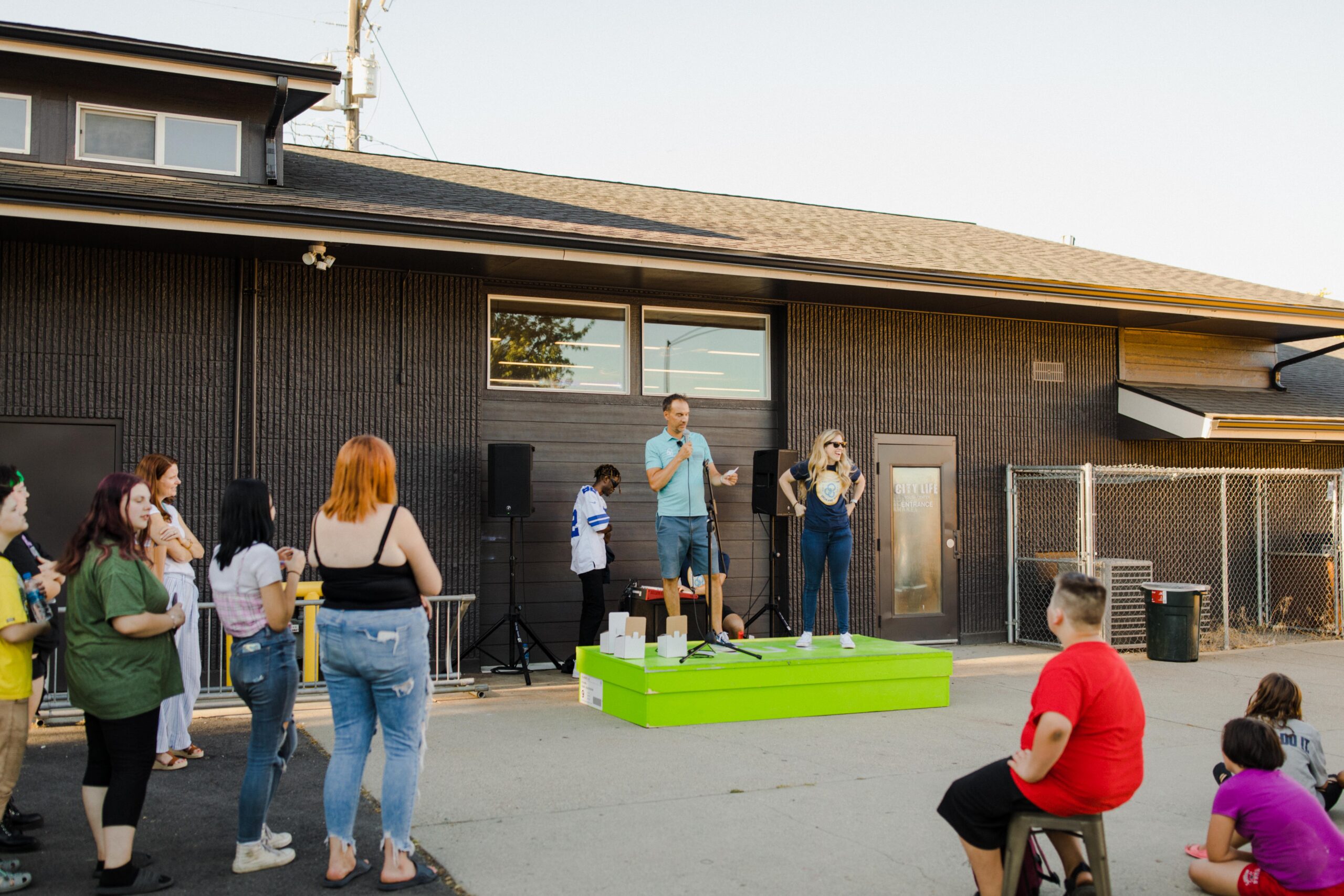 Two leaders on a platform sharing