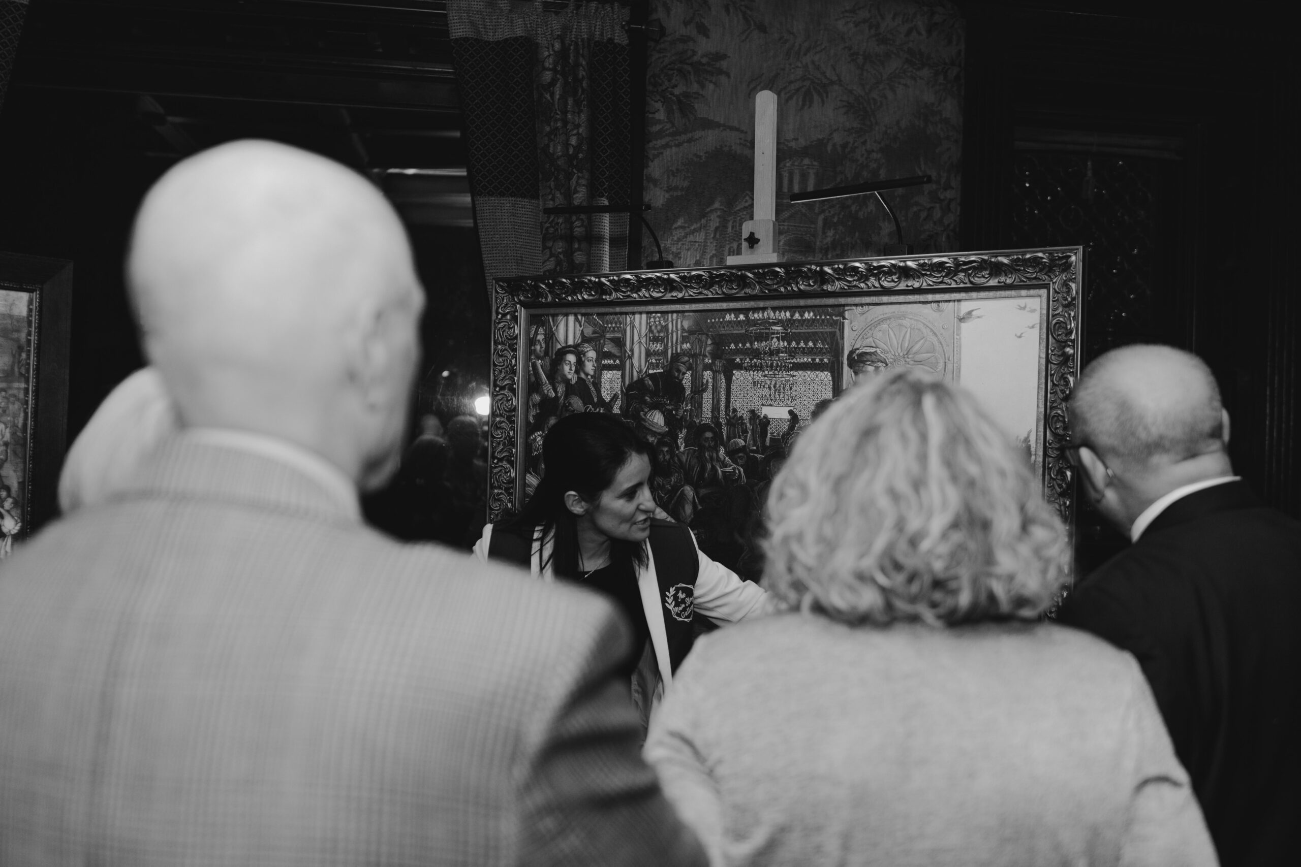 looking at a painting in a group